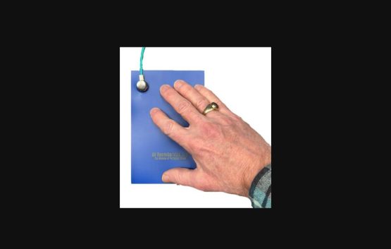 AVRS Grounding Mat with hand touching it before handling equipment
